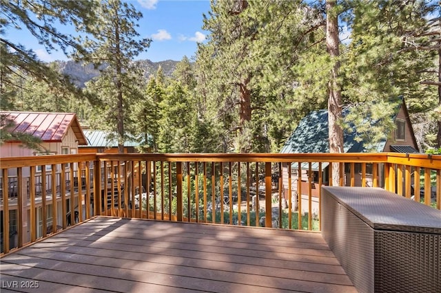 wooden terrace with a mountain view