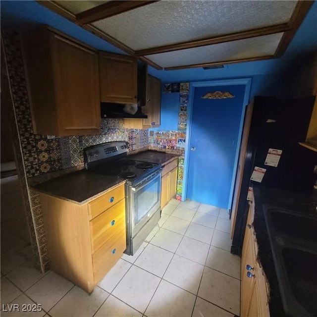 kitchen featuring light tile patterned floors, black electric range oven, range hood, and sink