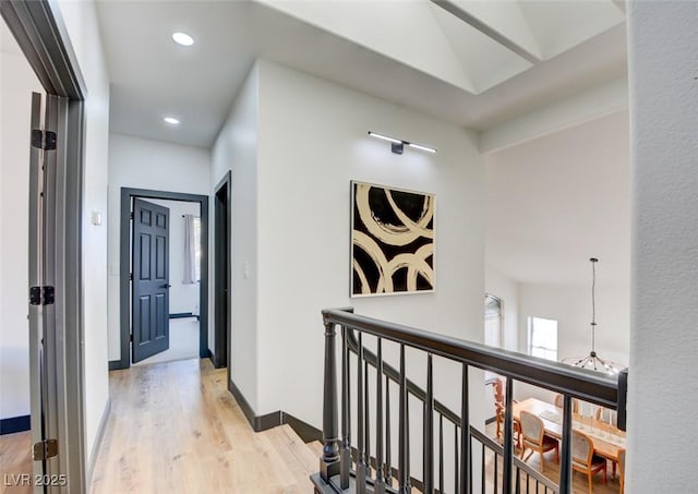 hall with light hardwood / wood-style floors