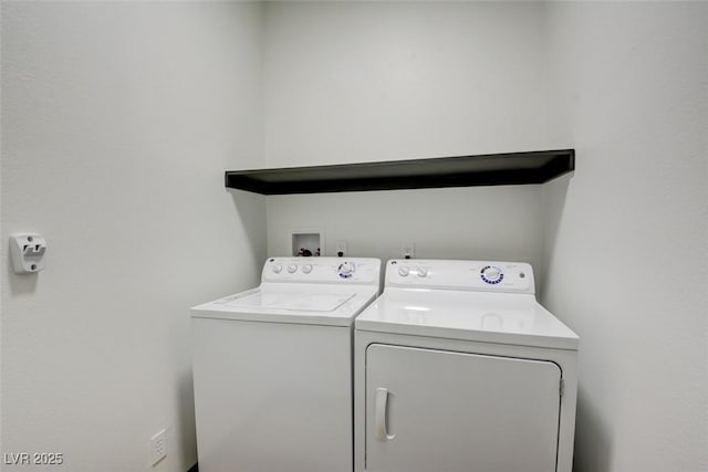 laundry area featuring washer and dryer