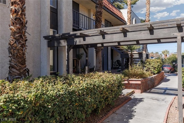 exterior space featuring a pergola