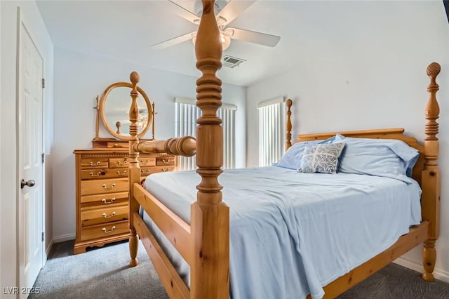 bedroom with ceiling fan and carpet floors