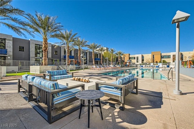 view of patio / terrace featuring a community pool