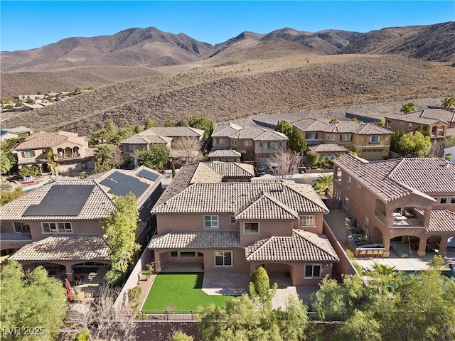 birds eye view of property featuring a residential view and a mountain view