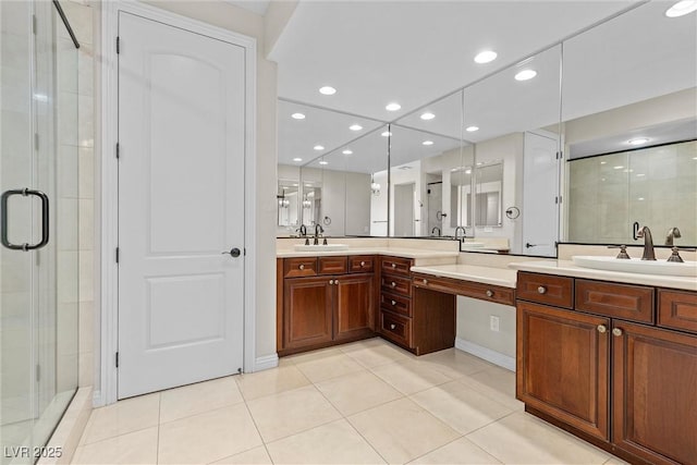 bathroom with recessed lighting, a shower stall, vanity, and tile patterned floors