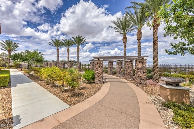 surrounding community featuring fence