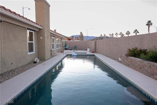 view of pool featuring a mountain view