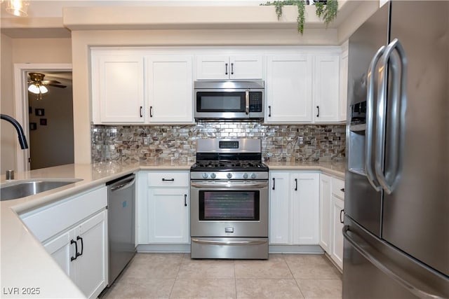 kitchen with white cabinetry, ceiling fan, and appliances with stainless steel finishes