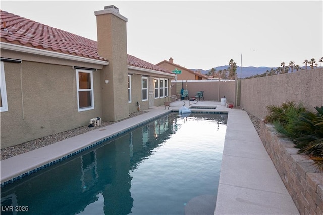 view of pool featuring a mountain view