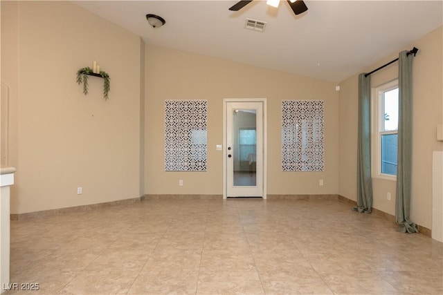 unfurnished room featuring ceiling fan and vaulted ceiling