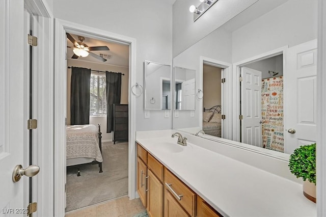 bathroom featuring vanity and ceiling fan