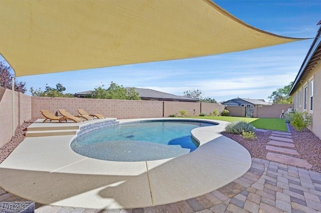 view of swimming pool featuring a patio