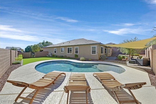 view of pool with a patio area and central air condition unit