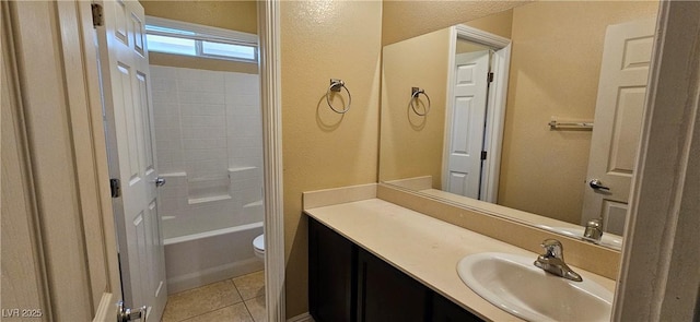 full bathroom featuring tile patterned flooring, vanity, shower / bath combination, and toilet