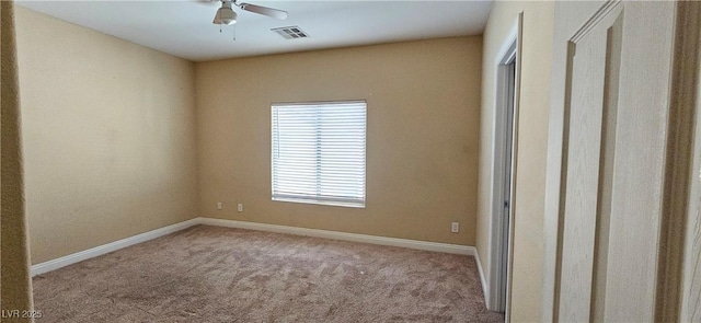 unfurnished bedroom featuring ceiling fan and light colored carpet