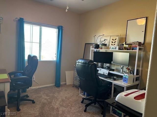 office area with baseboards and carpet floors