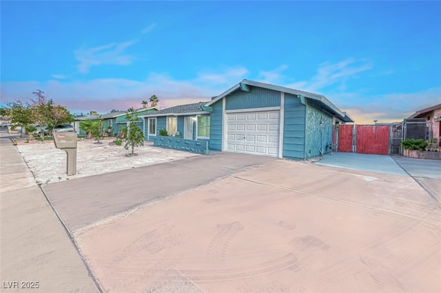 view of front of property with a garage