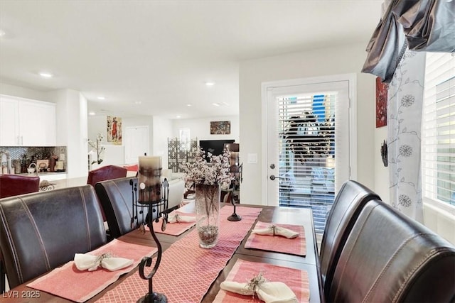 dining area featuring a wealth of natural light