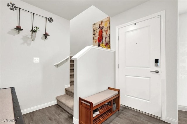 entrance foyer with dark hardwood / wood-style floors