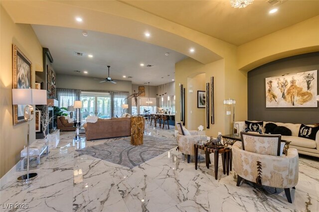 living room featuring ceiling fan