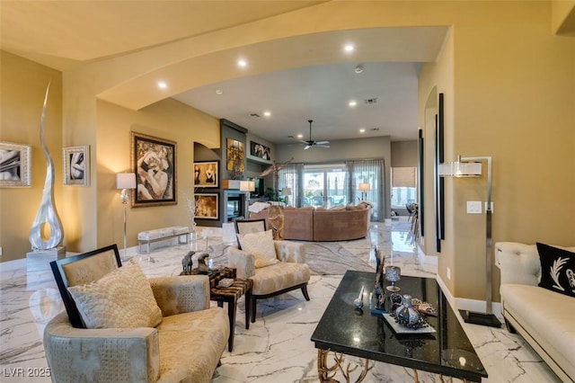 living room with ceiling fan