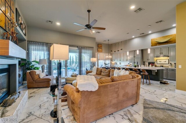 living room with ceiling fan