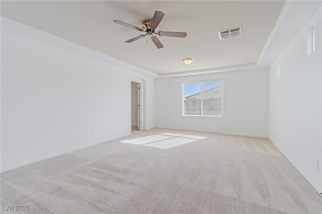 empty room with light carpet and ceiling fan