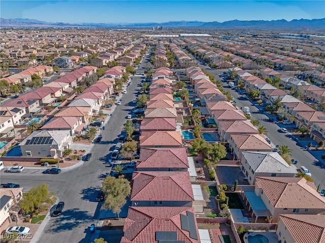 drone / aerial view featuring a mountain view