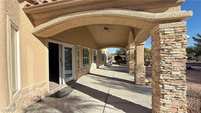 view of patio with ceiling fan