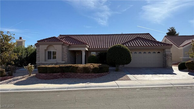8821 Sandspring Dr, Las Vegas, NV 89134 - mediterranean / spanish house with a garage