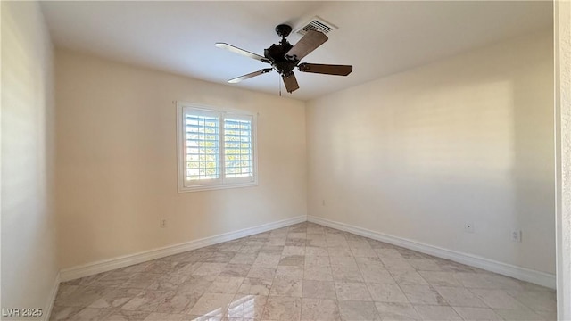 empty room featuring ceiling fan