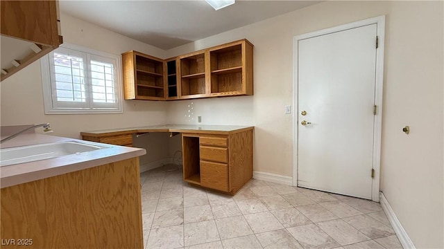 unfurnished office featuring sink