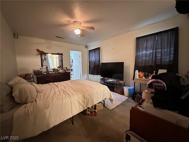 bedroom featuring carpet and ceiling fan