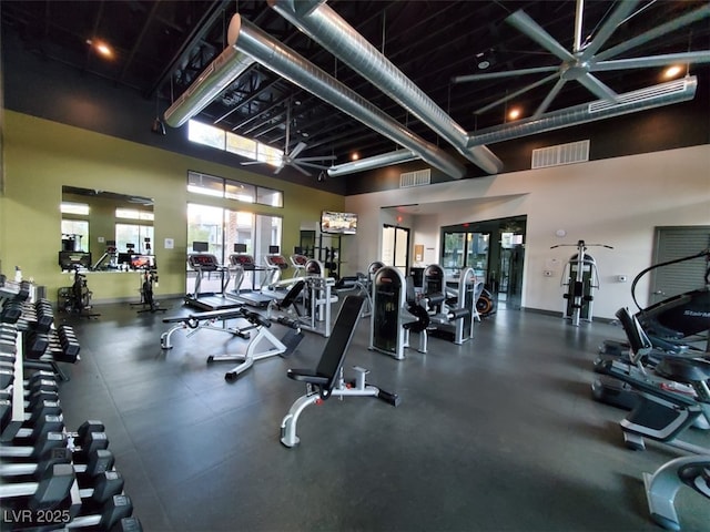 gym with a high ceiling