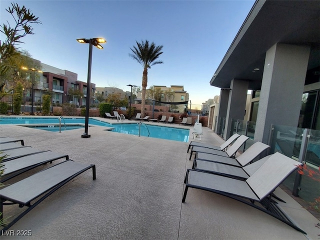 view of swimming pool featuring a patio