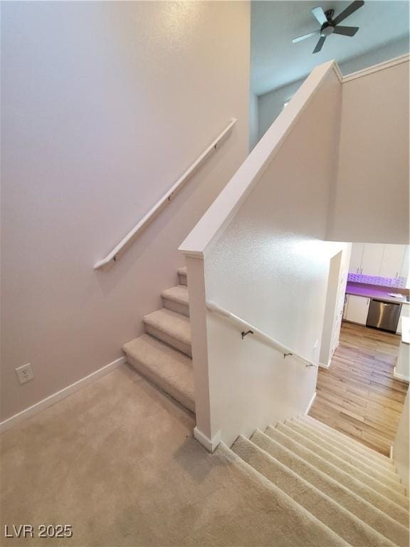 11251 Hidden Peak Ave Unit 212, Las Vegas, NV 89135 - stairs featuring ceiling fan, carpet flooring, and baseboards