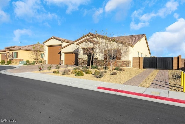 view of front of property with a garage