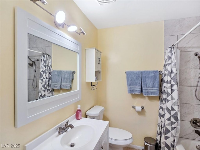 full bathroom featuring vanity, toilet, and shower / bath combo