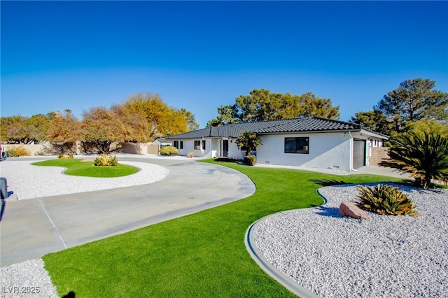 view of front of home with a front lawn