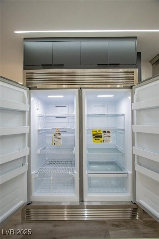 interior details featuring built in fridge