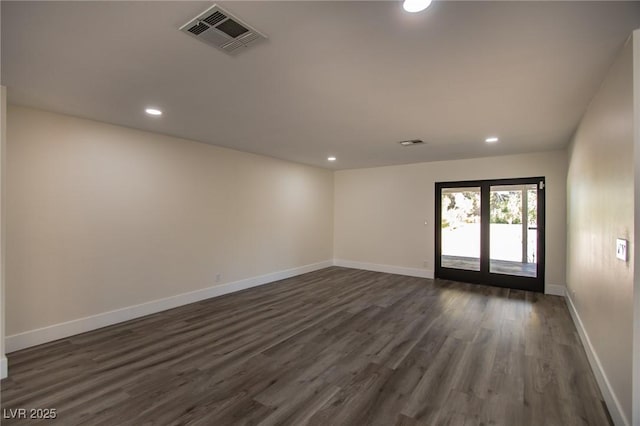 empty room featuring dark hardwood / wood-style floors