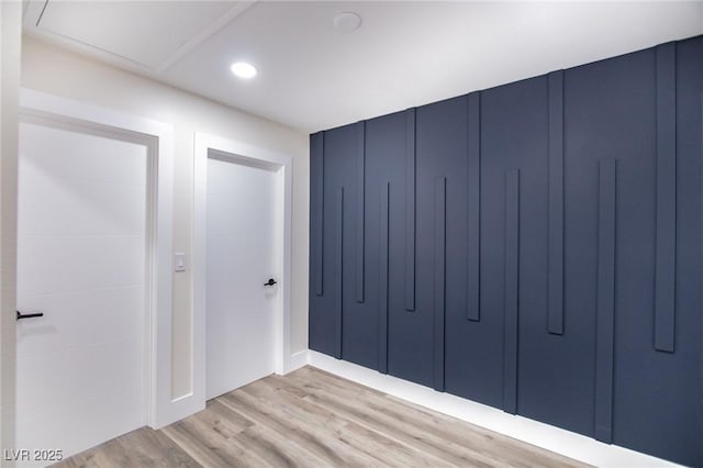 interior space featuring light hardwood / wood-style floors and a closet