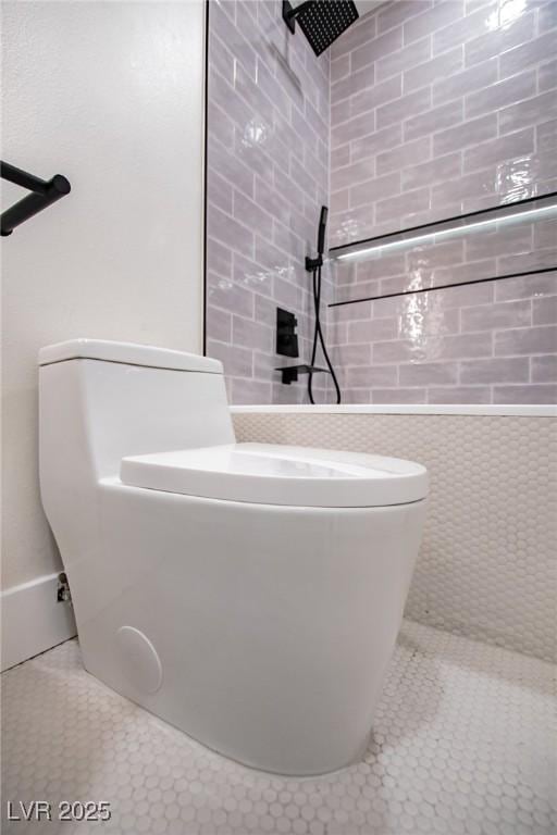 bathroom featuring tile patterned floors and a shower