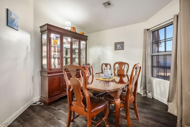 dining room featuring dark wood-type flooring