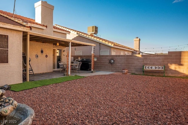 view of yard featuring a patio area and cooling unit