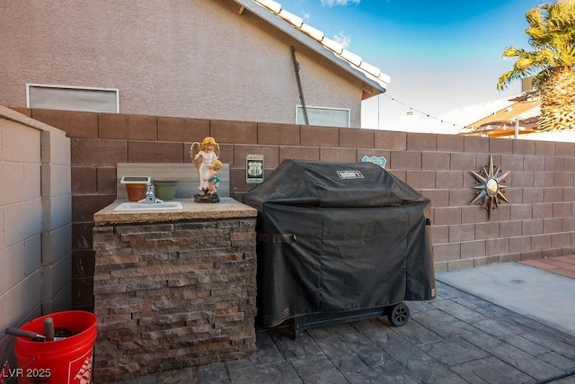 view of patio featuring grilling area