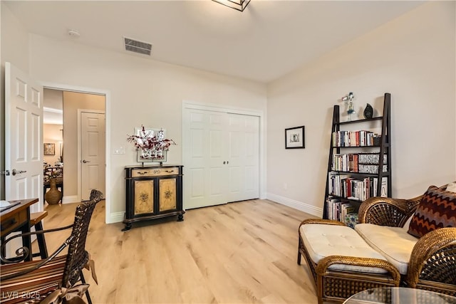 living area featuring light wood-type flooring