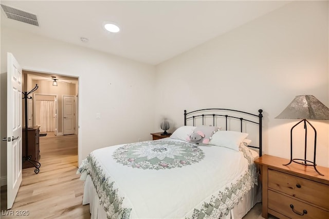 bedroom with light hardwood / wood-style flooring