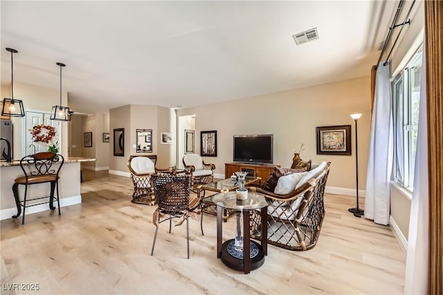 living room with light wood-type flooring