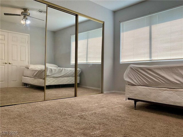 bedroom featuring carpet flooring and ceiling fan